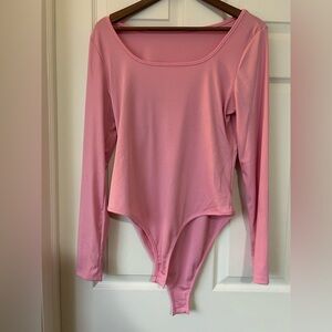 Bubble gum pink long sleeve ribbed bodysuit